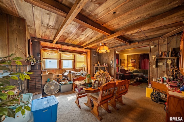 509 W Mcclure Ave, Peoria, IL 61604 - carpeted dining space featuring a wood ceiling with exposed beams and wood walls
