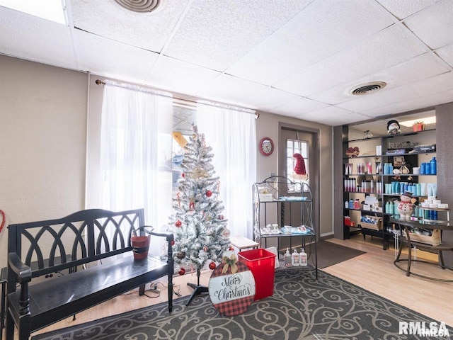 3409 Meadow Ave Unit 61611, East Peoria, IL 61611 - living area featuring wood finished floors and a drop ceiling