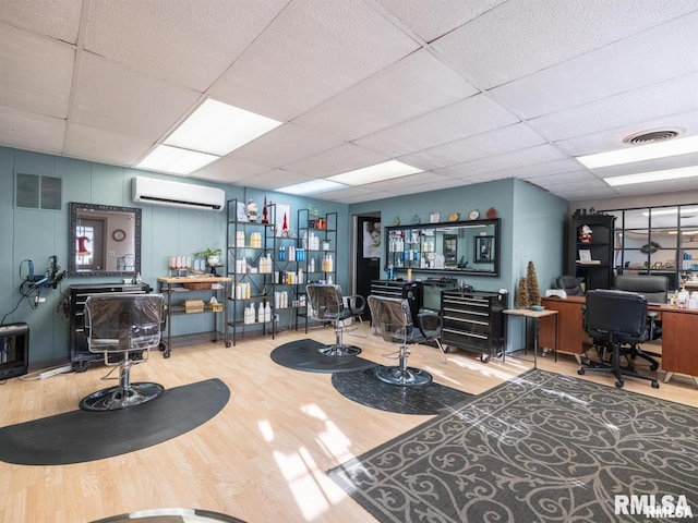 3409 Meadow Ave Unit 61611, East Peoria, IL 61611 - office space featuring an AC wall unit, a paneled ceiling, and wood finished floors