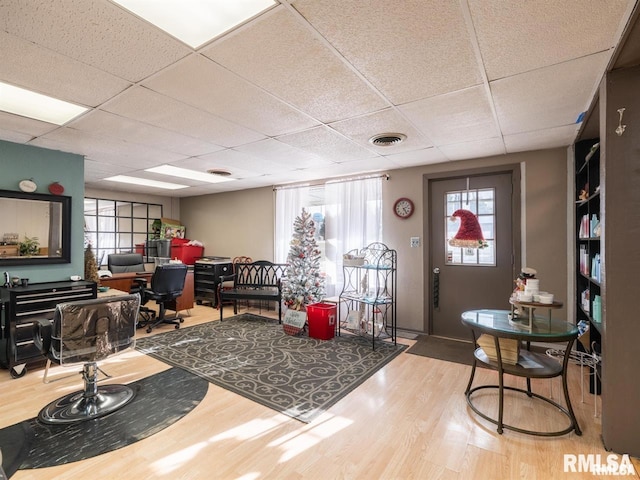 3409 Meadow Ave Unit 61611, East Peoria, IL 61611 - living area with wood finished floors, a paneled ceiling, and a desk