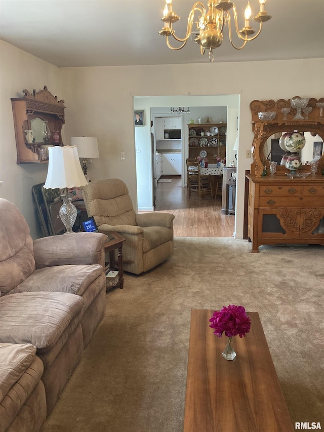 301 N Louise St, La Harpe, IL 61450 - carpeted living room featuring a chandelier