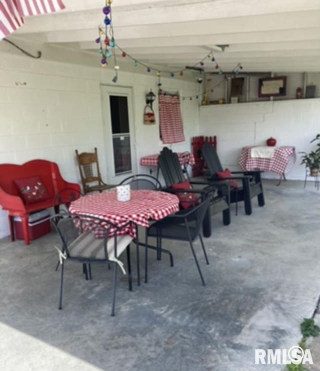 301 N Louise St, La Harpe, IL 61450 - view of patio featuring outdoor dining space