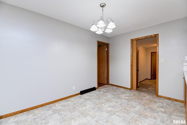113 Highview Ter, East Peoria, IL 61611 - unfurnished room featuring a chandelier and baseboards