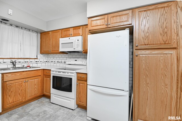 113 Highview Ter, East Peoria, IL 61611 - kitchen featuring white appliances, decorative backsplash, light countertops, and brown cabinetry