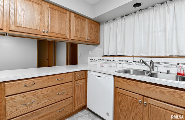 113 Highview Ter, East Peoria, IL 61611 - kitchen featuring dishwasher, light countertops, decorative backsplash, and brown cabinetry
