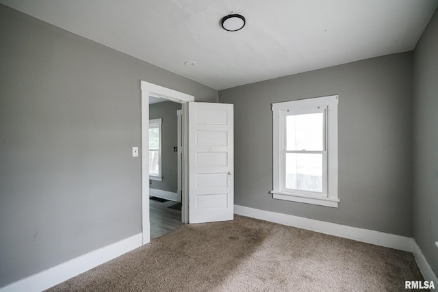 409 E Embert Pl, Peoria, IL 61603 - carpeted spare room with healthy amount of natural light