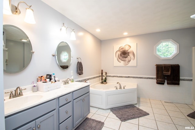 116 Field Ct, East Peoria, IL 61611 - full bathroom featuring double vanity, tile patterned flooring, a garden tub, recessed lighting, and tile walls