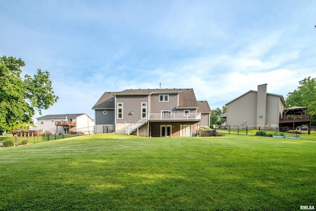 116 Field Ct, East Peoria, IL 61611 - rear view of house with a wooden deck, a fenced backyard, and stairs