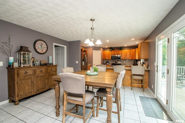 116 Field Ct, East Peoria, IL 61611 - dining room with a chandelier, light tile patterned flooring, and recessed lighting