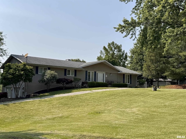15 Elmo Dr, Macomb, IL 61455 - ranch-style house with a front lawn