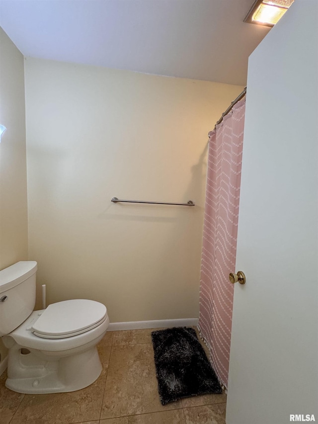 15 Elmo Dr, Macomb, IL 61455 - full bath with tile patterned floors and curtained shower