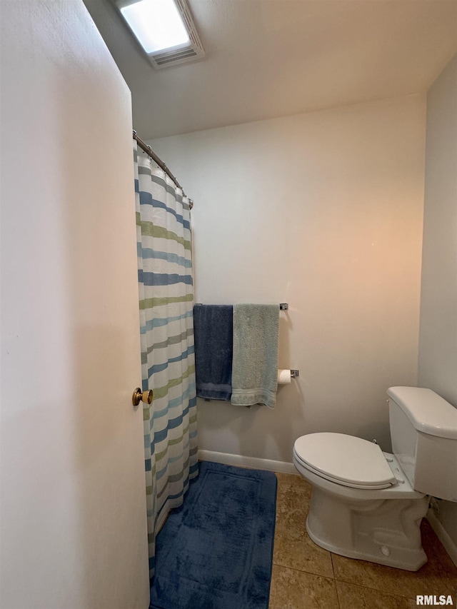 15 Elmo Dr, Macomb, IL 61455 - bathroom featuring tile patterned floors and curtained shower