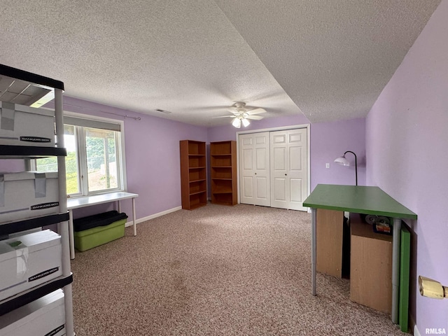 15 Elmo Dr, Macomb, IL 61455 - office space with a textured ceiling, a ceiling fan, and carpet