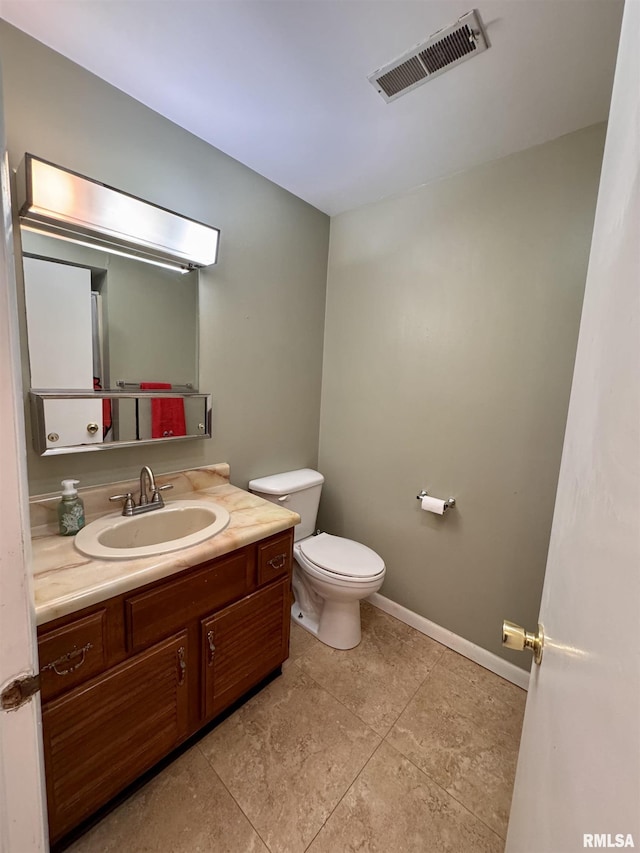 15 Elmo Dr, Macomb, IL 61455 - bathroom with vanity and tile patterned floors