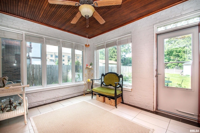3316 N Biltmore Ave, Peoria, IL 61604 - sunroom featuring tile patterned floors, ornamental molding, brick wall, and wood ceiling