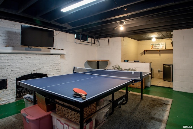 3316 N Biltmore Ave, Peoria, IL 61604 - playroom featuring concrete flooring and concrete block wall
