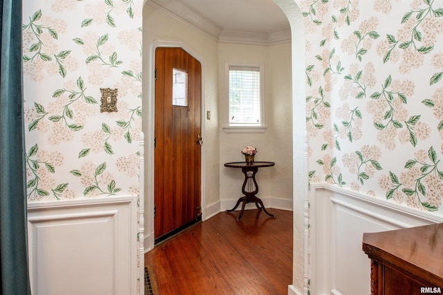 3316 N Biltmore Ave, Peoria, IL 61604 - entryway featuring dark wood-style floors, arched walkways, and crown molding