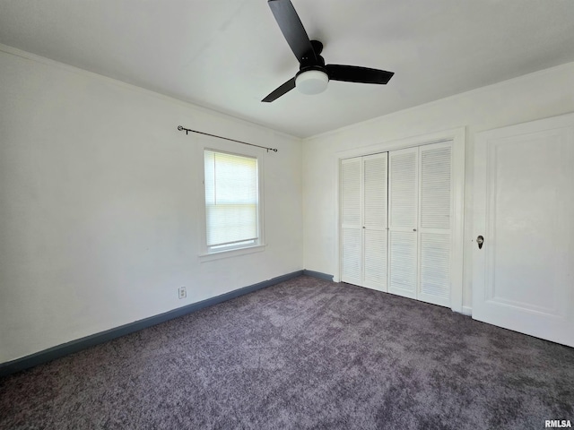 1507 W Circle Rd, Peoria, IL 61604 - unfurnished bedroom featuring dark colored carpet, crown molding, a closet, and a ceiling fan