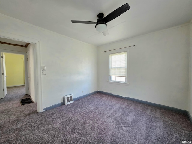 1507 W Circle Rd, Peoria, IL 61604 - spare room featuring carpet floors, crown molding, and a ceiling fan
