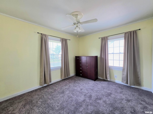 1507 W Circle Rd, Peoria, IL 61604 - unfurnished bedroom with multiple windows, crown molding, carpet flooring, and ceiling fan