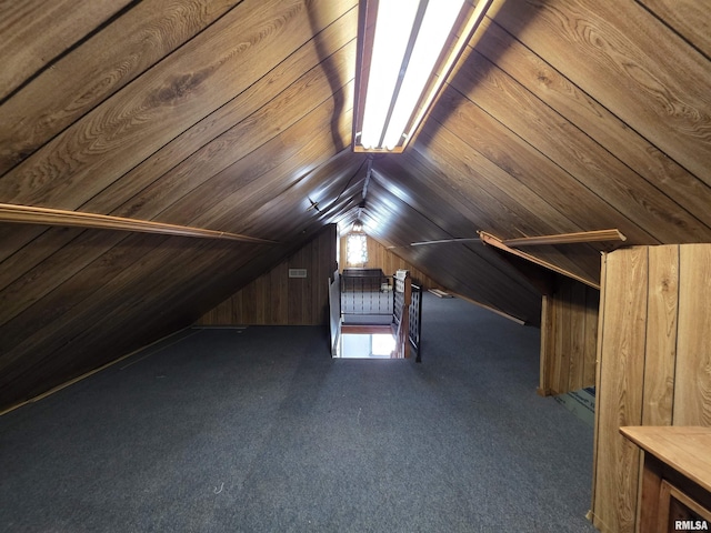 1507 W Circle Rd, Peoria, IL 61604 - bonus room with wood walls, lofted ceiling, and carpet floors