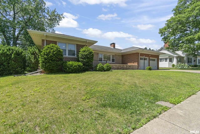 502 W Crestwood Dr, Peoria, IL 61614 - view of front of home featuring brick siding, an attached garage, a front lawn, a chimney, and driveway