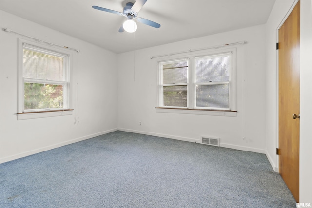 502 W Crestwood Dr, Peoria, IL 61614 - unfurnished bedroom featuring carpet flooring and a ceiling fan