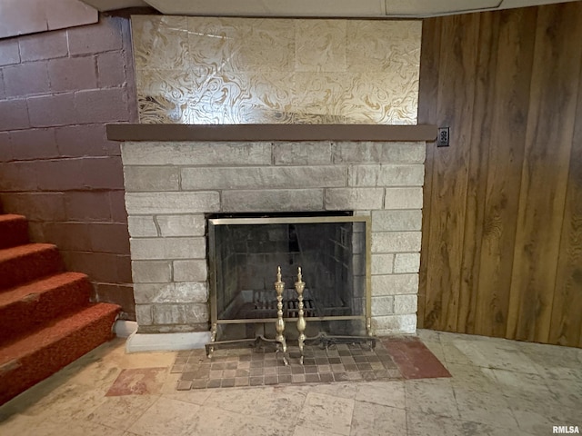 502 W Crestwood Dr, Peoria, IL 61614 - detailed view of a fireplace, wooden walls, and concrete block wall
