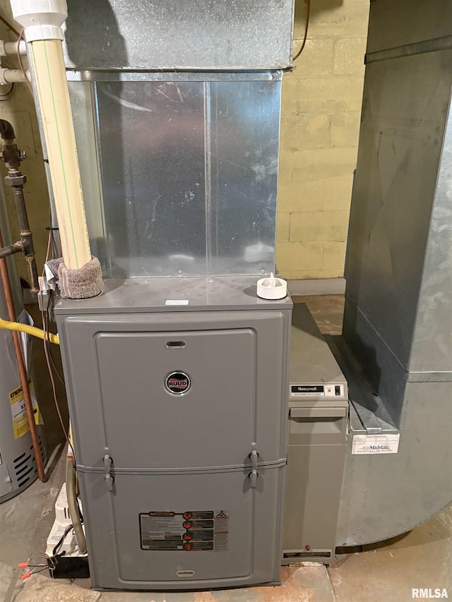 502 W Crestwood Dr, Peoria, IL 61614 - utility room featuring heating unit