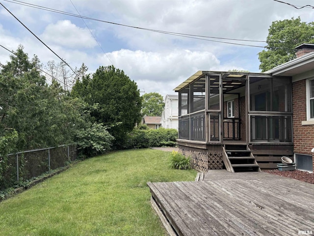 502 W Crestwood Dr, Peoria, IL 61614 - view of yard featuring a deck and a sunroom