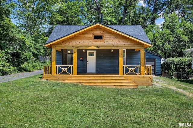 1431 E Rouse Ave, Peoria, IL 61614 - view of front facade with a shingled roof and a front lawn