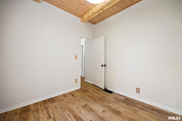 1431 E Rouse Ave, Peoria, IL 61614 - spare room featuring light wood-style flooring and a wood ceiling with exposed beams