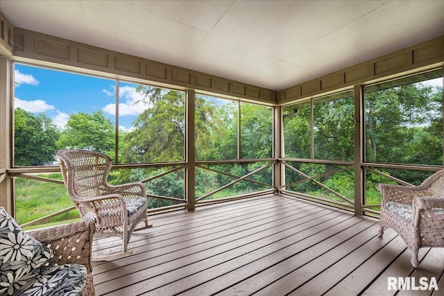 1522 N Stone School Rd, Elmwood, IL 61529 - sunroom / solarium featuring view of wooded area