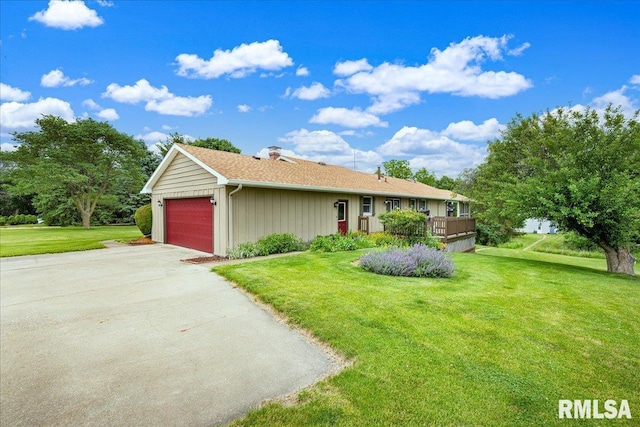 1522 N Stone School Rd, Elmwood, IL 61529 - single story home featuring a front yard, a garage, and concrete driveway