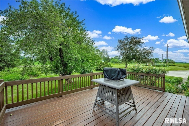 1522 N Stone School Rd, Elmwood, IL 61529 - wooden terrace with grilling area and a yard