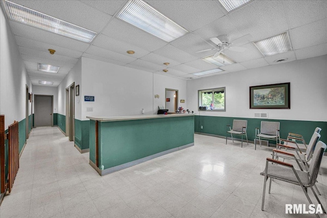 1522 N Stone School Rd, Elmwood, IL 61529 - reception featuring a ceiling fan and a paneled ceiling