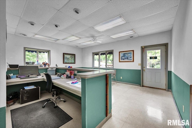 1522 N Stone School Rd, Elmwood, IL 61529 - office area with built in desk, a ceiling fan, and a paneled ceiling