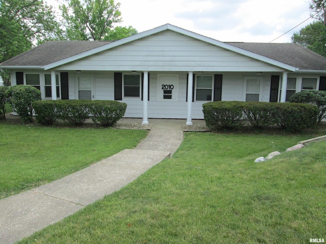 2010 W Westbrook Dr, Peoria, IL 61614 - ranch-style home with roof with shingles, a front lawn, and a porch