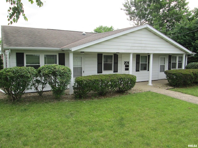 2010 W Westbrook Dr, Peoria, IL 61614 - single story home featuring a front yard and a shingled roof