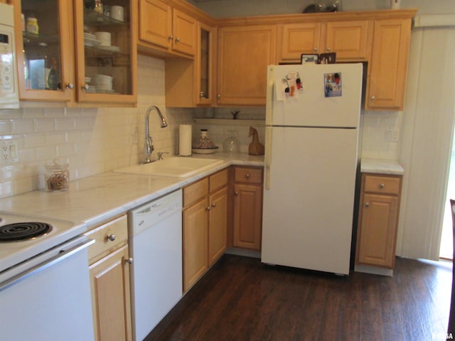 2010 W Westbrook Dr, Peoria, IL 61614 - kitchen with white appliances, light countertops, dark wood-style floors, and decorative backsplash