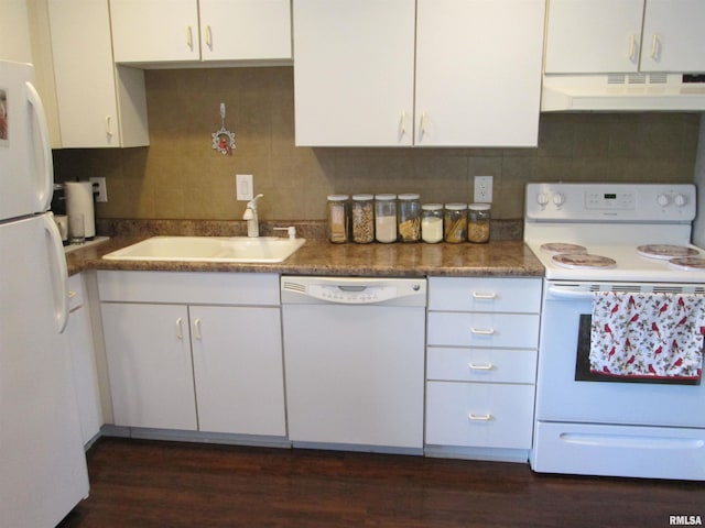 2010 W Westbrook Dr, Peoria, IL 61614 - kitchen featuring white appliances, under cabinet range hood, dark wood finished floors, white cabinetry, and decorative backsplash