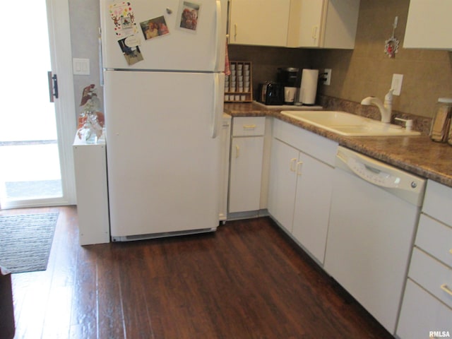 2010 W Westbrook Dr, Peoria, IL 61614 - kitchen featuring white appliances, dark wood-type flooring, tasteful backsplash, and white cabinets