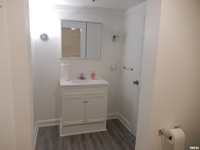 300 E Summer St, Plymouth, IL 62367 - bathroom with wood finished floors and vanity