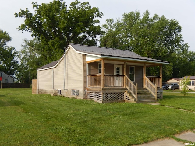 300 E Summer St, Plymouth, IL 62367 - view of front of property featuring a porch, a front lawn, a metal roof, and stairway