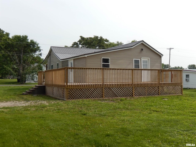 300 E Summer St, Plymouth, IL 62367 - rear view of property with a deck and a yard