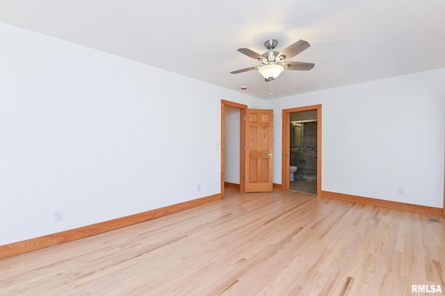 215 S Pleasant Hill Rd, East Peoria, IL 61611 - spare room with light wood-type flooring and a ceiling fan
