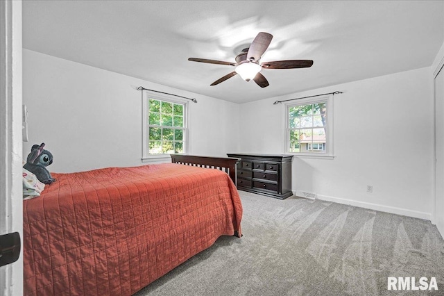 1536 Hickory Point Rd, Metamora, IL 61548 - carpeted bedroom featuring baseboards and ceiling fan