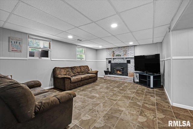 1536 Hickory Point Rd, Metamora, IL 61548 - living area featuring a fireplace, a drop ceiling, and recessed lighting