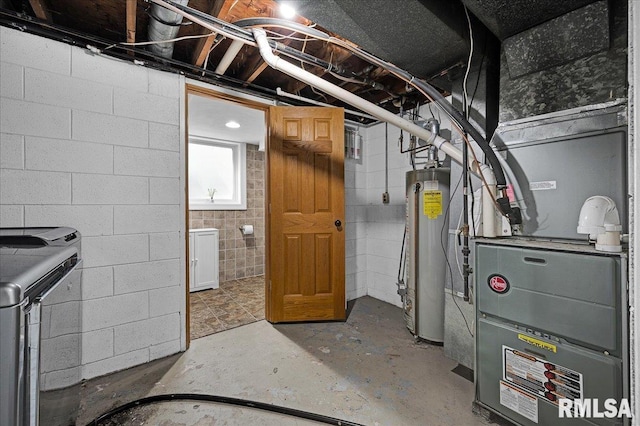 1536 Hickory Point Rd, Metamora, IL 61548 - basement with water heater and washing machine and clothes dryer