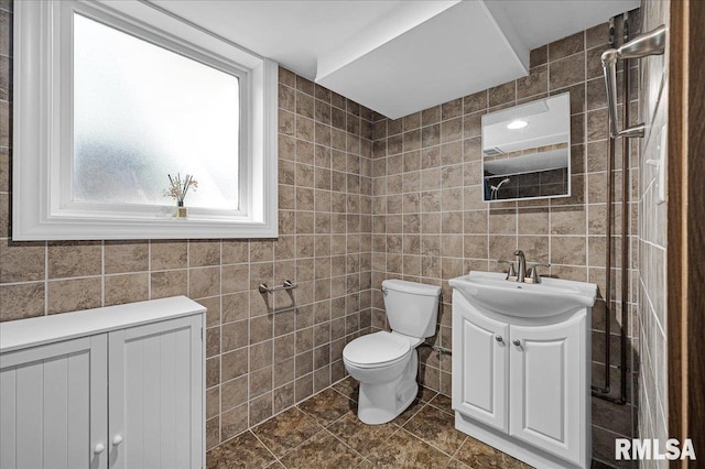 1536 Hickory Point Rd, Metamora, IL 61548 - bathroom with vanity, tile patterned flooring, and tile walls